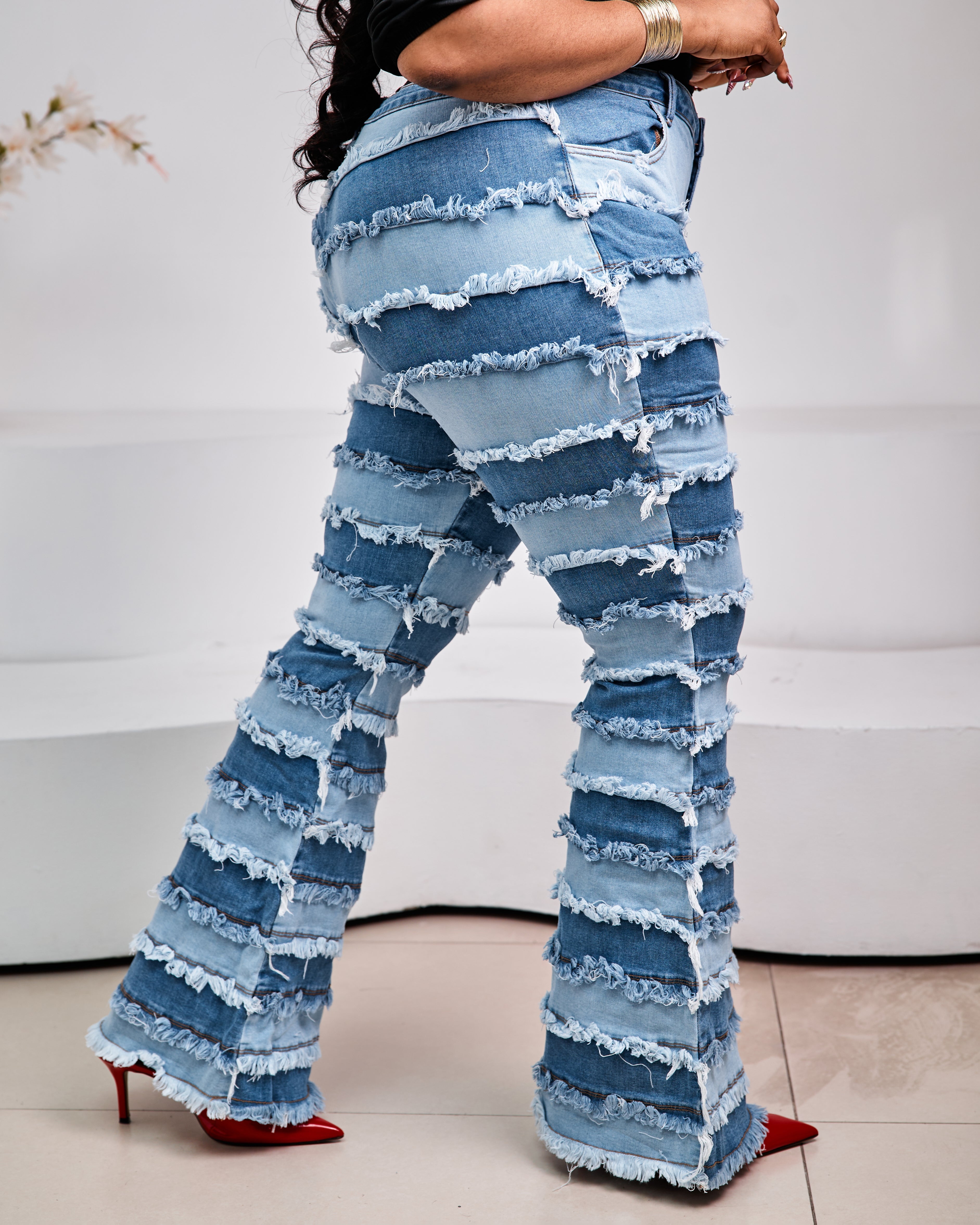 Sterra Fashion Milan Fringe Denim Jeans with stylish fringe details, classic blue denim, and a relaxed fit.