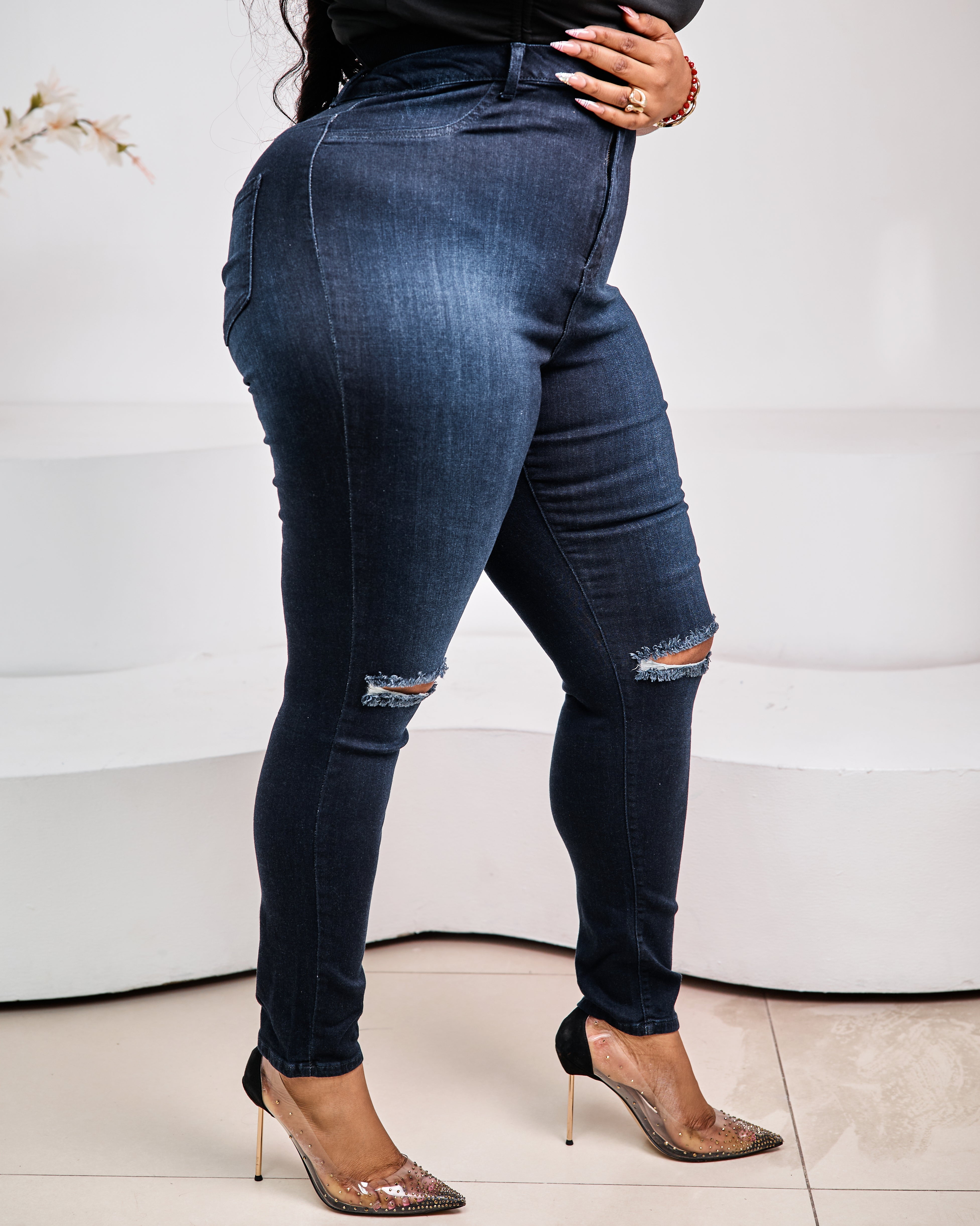 Sterra Fashion Éclipse Sculpt Denim jeans featuring a fitted design and classic blue wash, displayed on a neutral background.