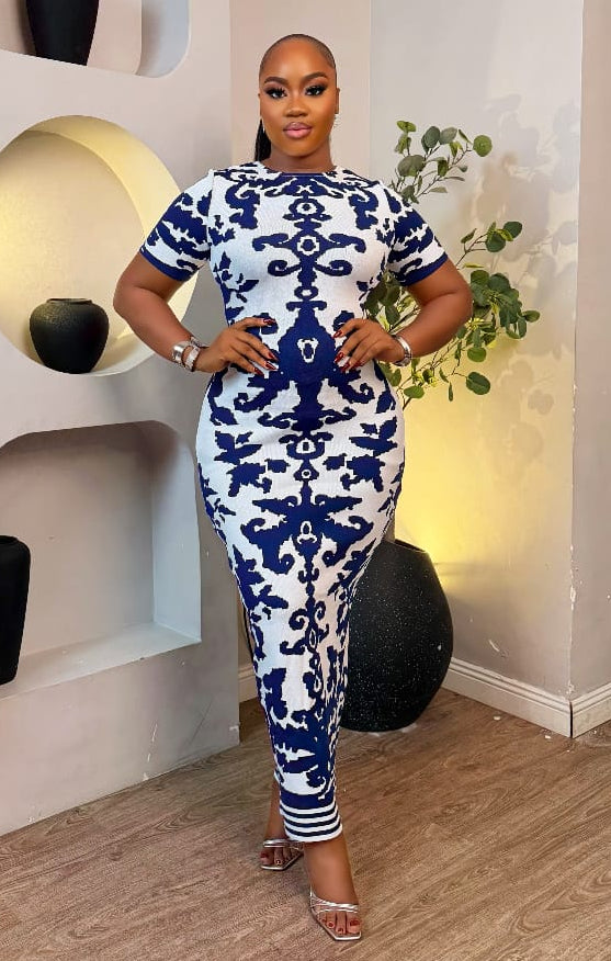Althea Royale Dress by STERA FASHION featuring elegant fabric, intricate details, and a stylish design for special occasions.