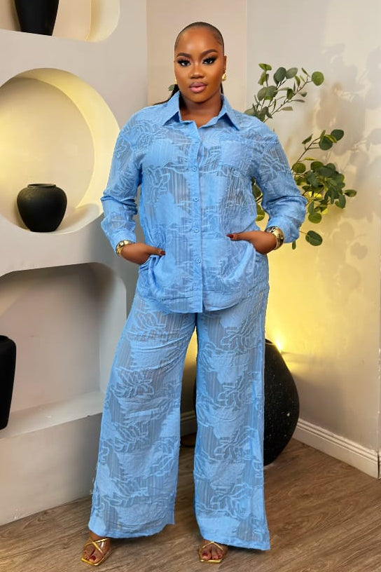 Blue Élise set by STERA FASHION featuring a stylish, coordinated outfit with top and skirt in vibrant blue fabric.