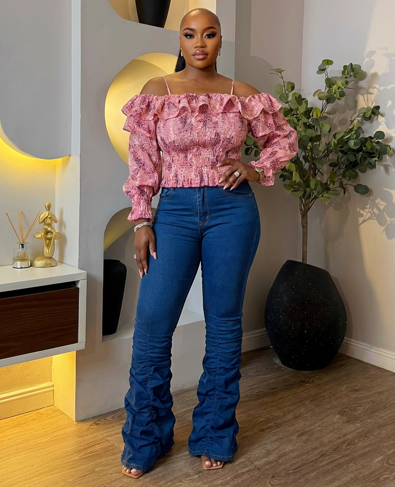 Pink blush ruffle top from STERA FASHION BOUTIQUE featuring soft fabric and feminine ruffle details.