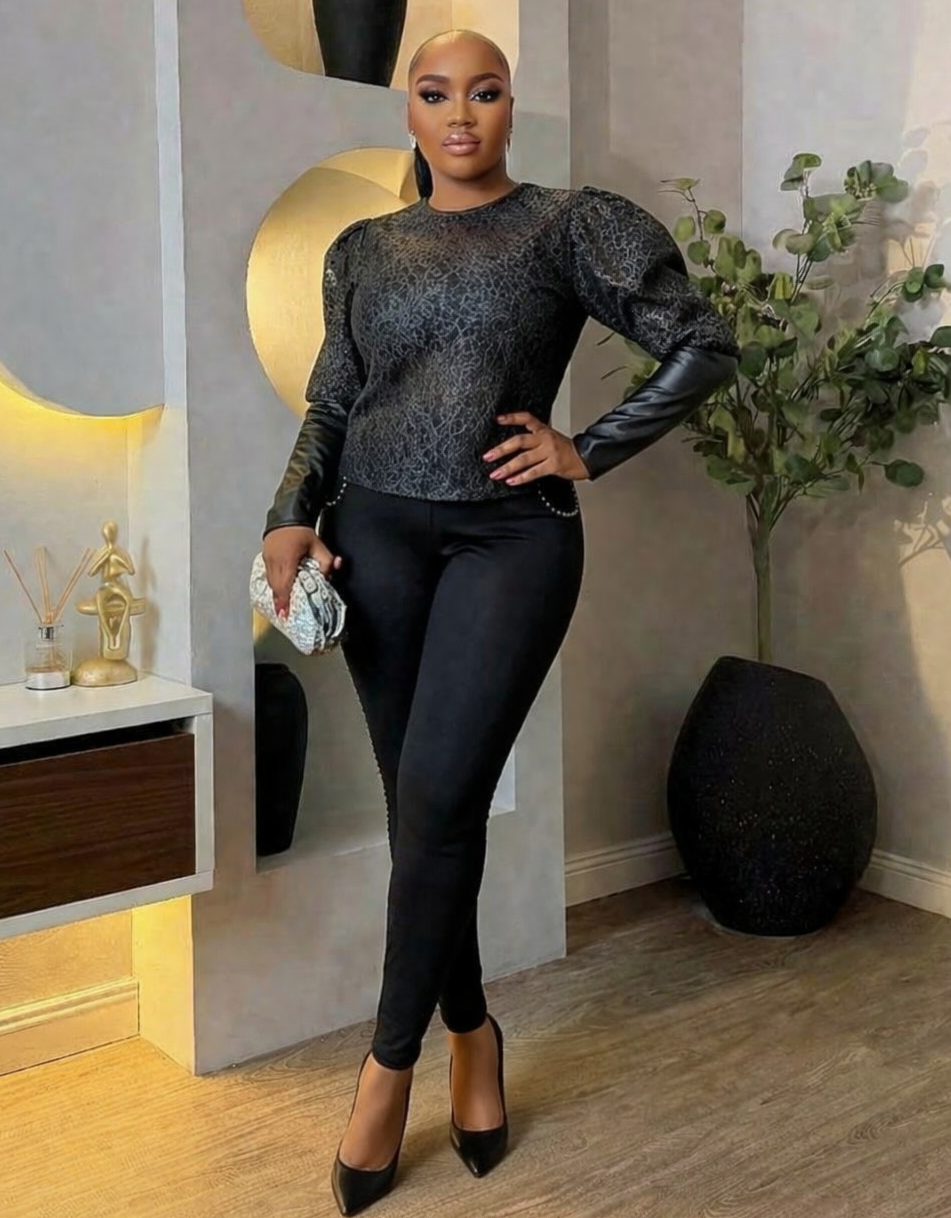 Black midnight lace top by STERA FASHION BOUTIQUE featuring intricate lace details and a stylish, feminine design.