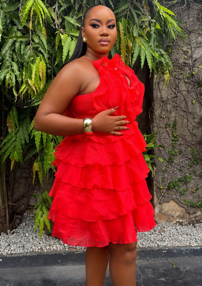 Sterra Fashion Rouge Ruelle dress displayed on a mannequin, featuring a stylish, elegant design in vibrant fabric.