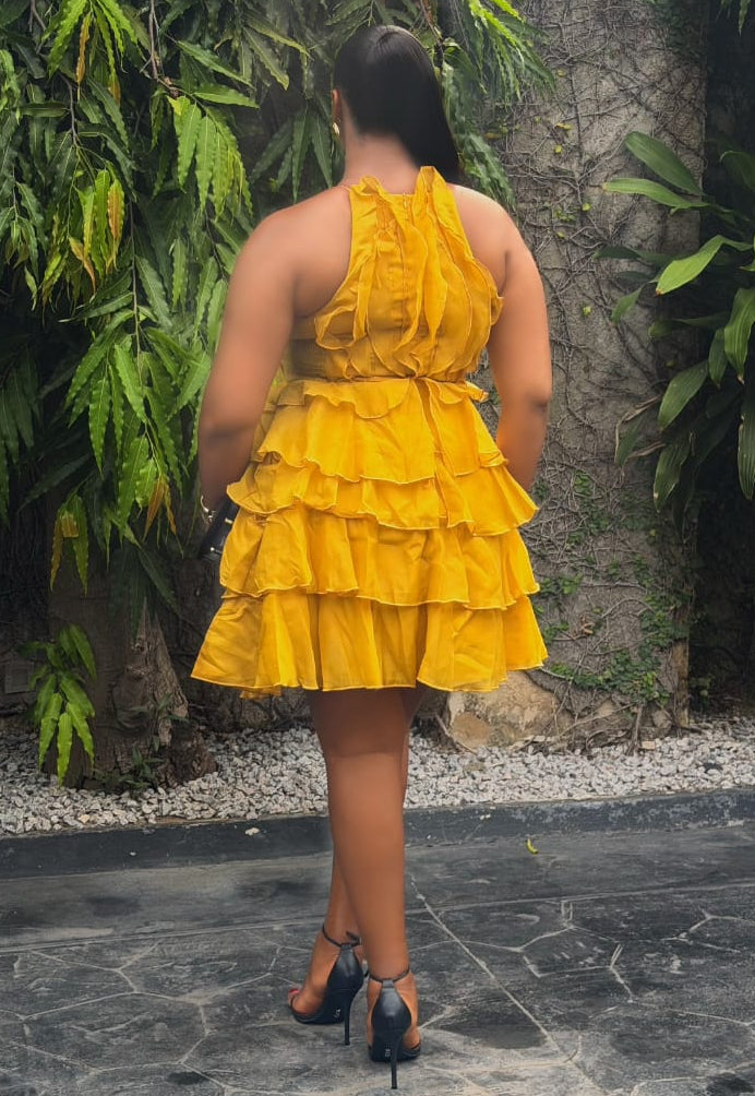 Amber Ruelle Dress by STERA FASHION, showing a stylish, flowy dress in warm amber tones with elegant details.