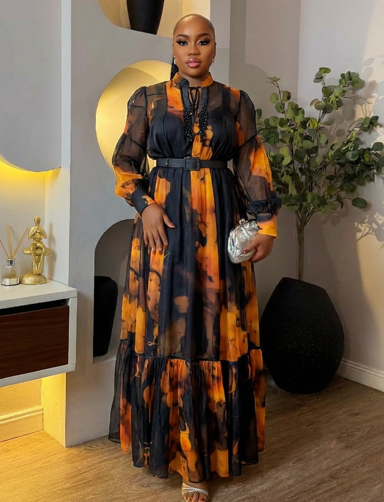 Elegant black dress with under slip and belt from STERA FASHION BOUTIQUE, styled for sophisticated evening wear.