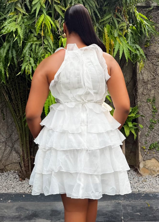 Ivory Ruelle Dress by STERA FASHION, featuring elegant flowy fabric and a stylish silhouette, perfect for dressy occasions.