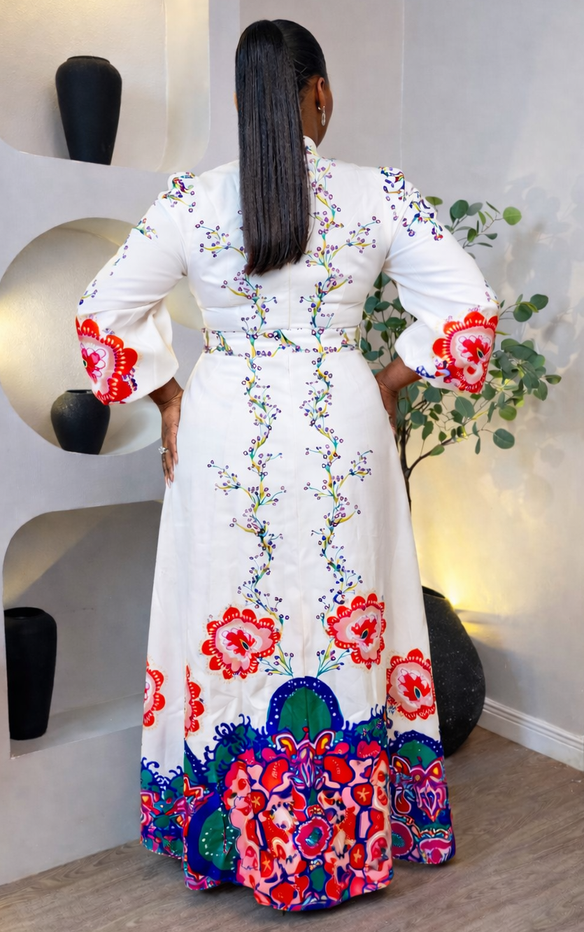 Colorful Petal Tapestry Maxi dress by STERA FASHION BOUTIQUE, featuring vibrant floral patterns and flowing fabric.