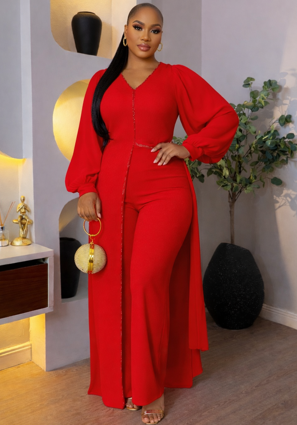 Crimson embellished jumpsuit from STERA FASHION BOUTIQUE featuring intricate beadwork and a stylish, fitted design.