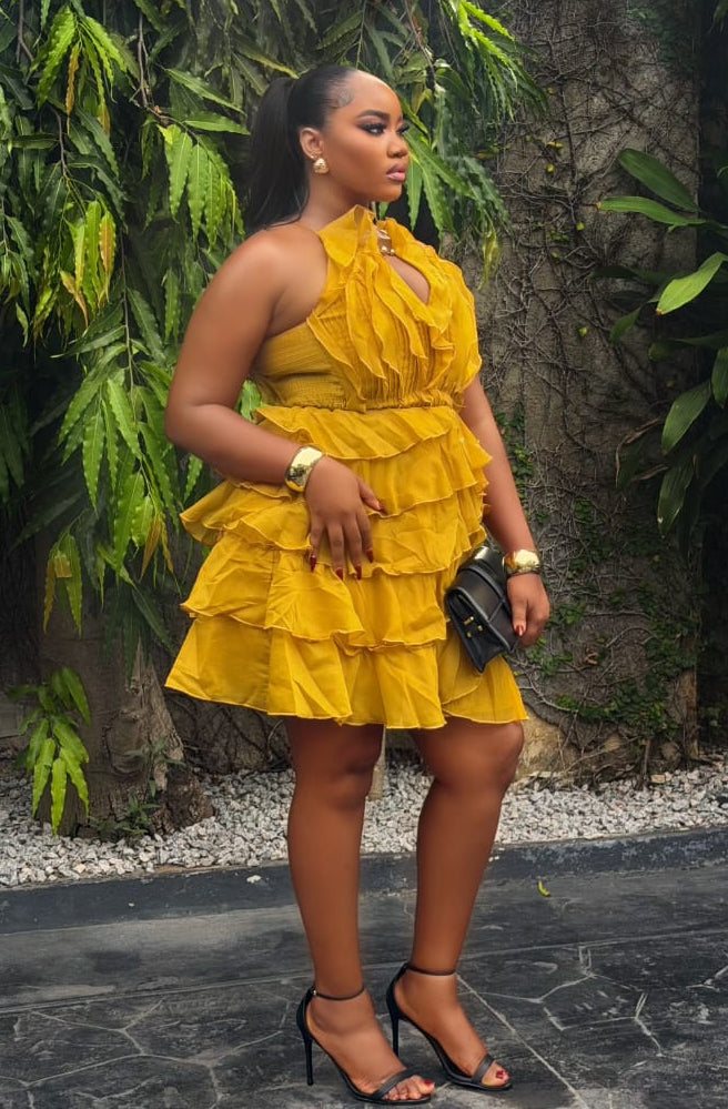 Amber Ruelle dress by STERA FASHION featuring a flowing silhouette and elegant design, shown on a model.