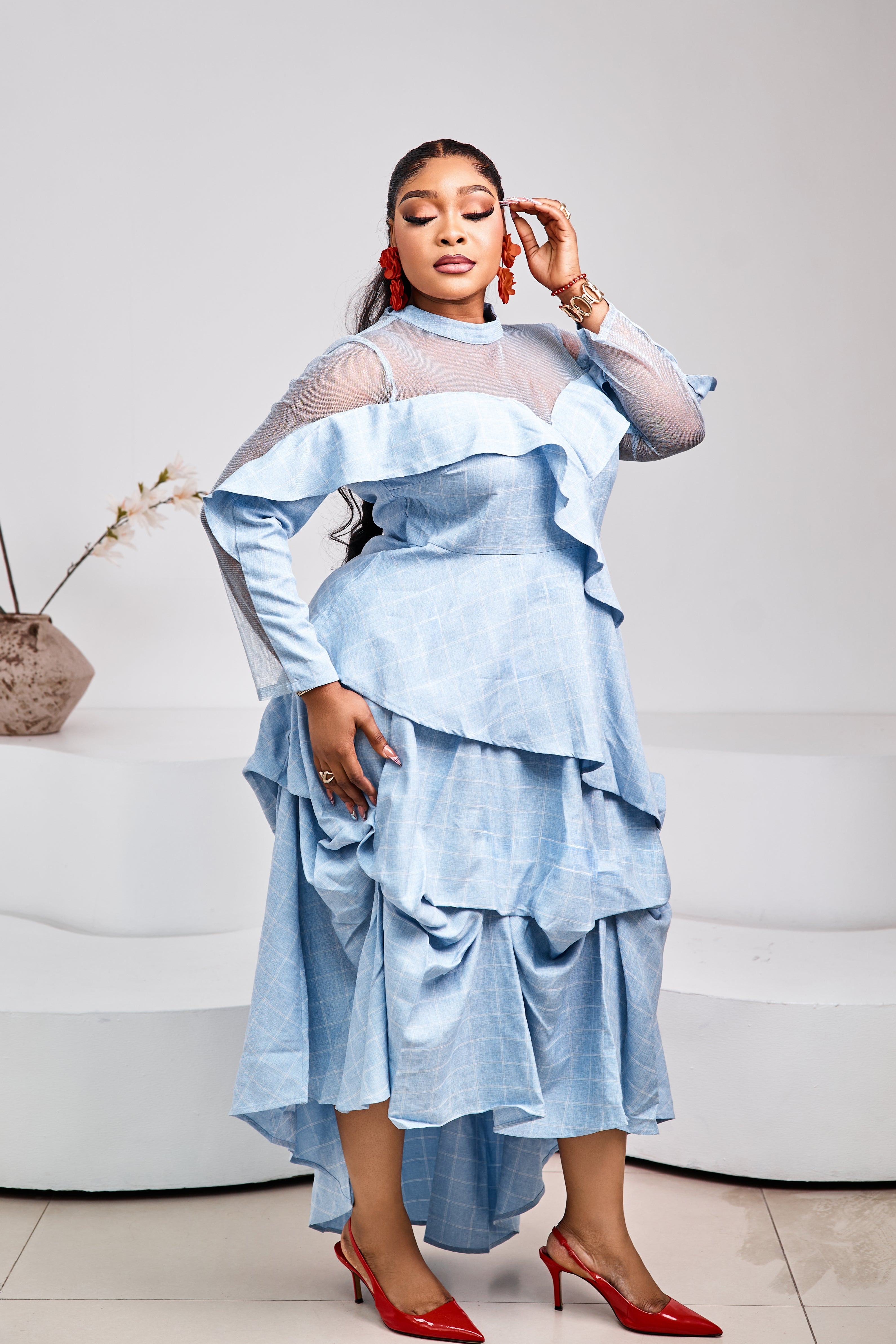 Sterra Fashion Kaima Couture set featuring a stylish, elegant outfit with intricate detailing and vibrant colors on a mannequin.
