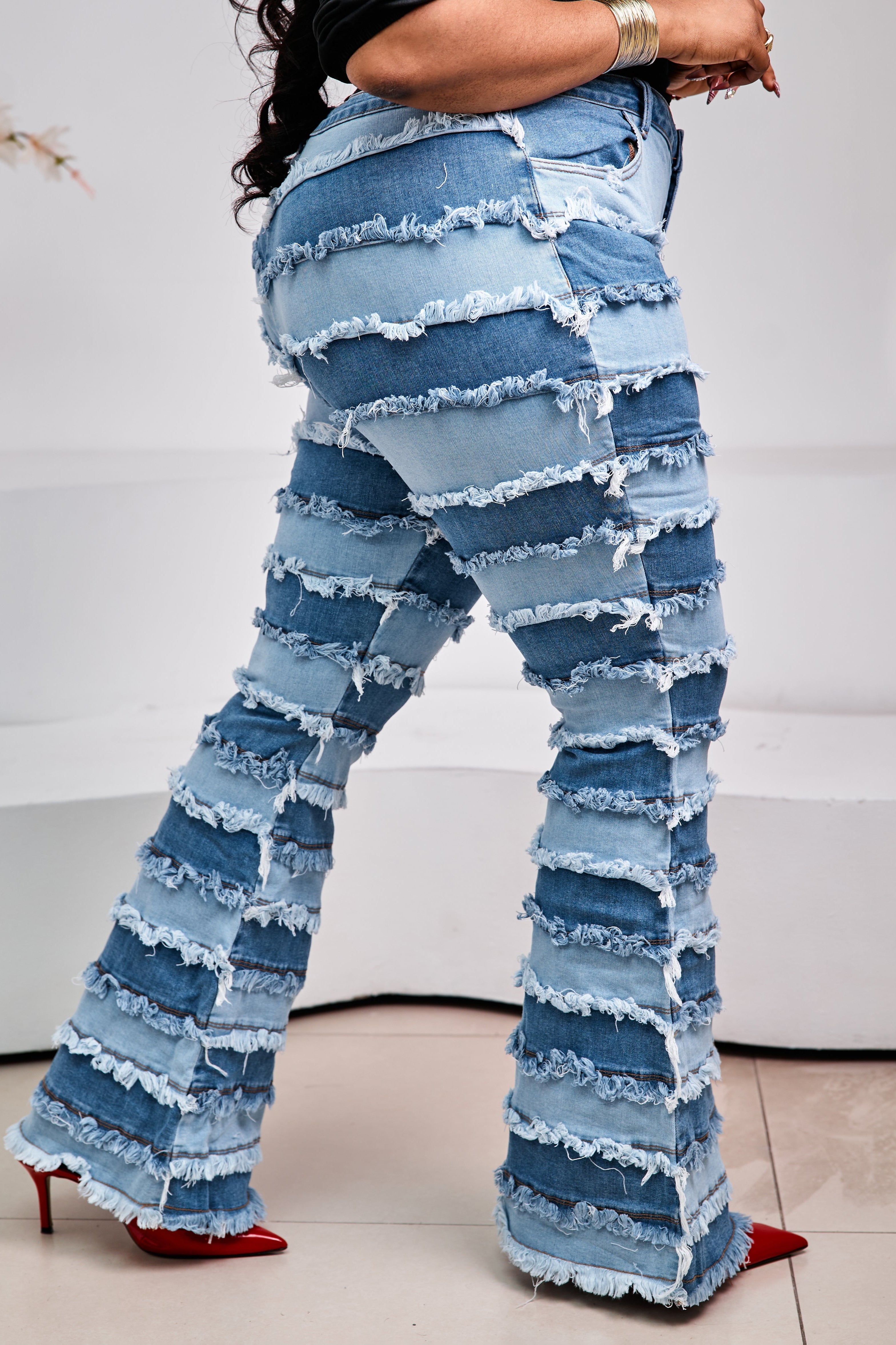 Sterra Fashion Milan Fringe Denim Jeans with stylish fringe details, classic blue denim, and a relaxed fit.