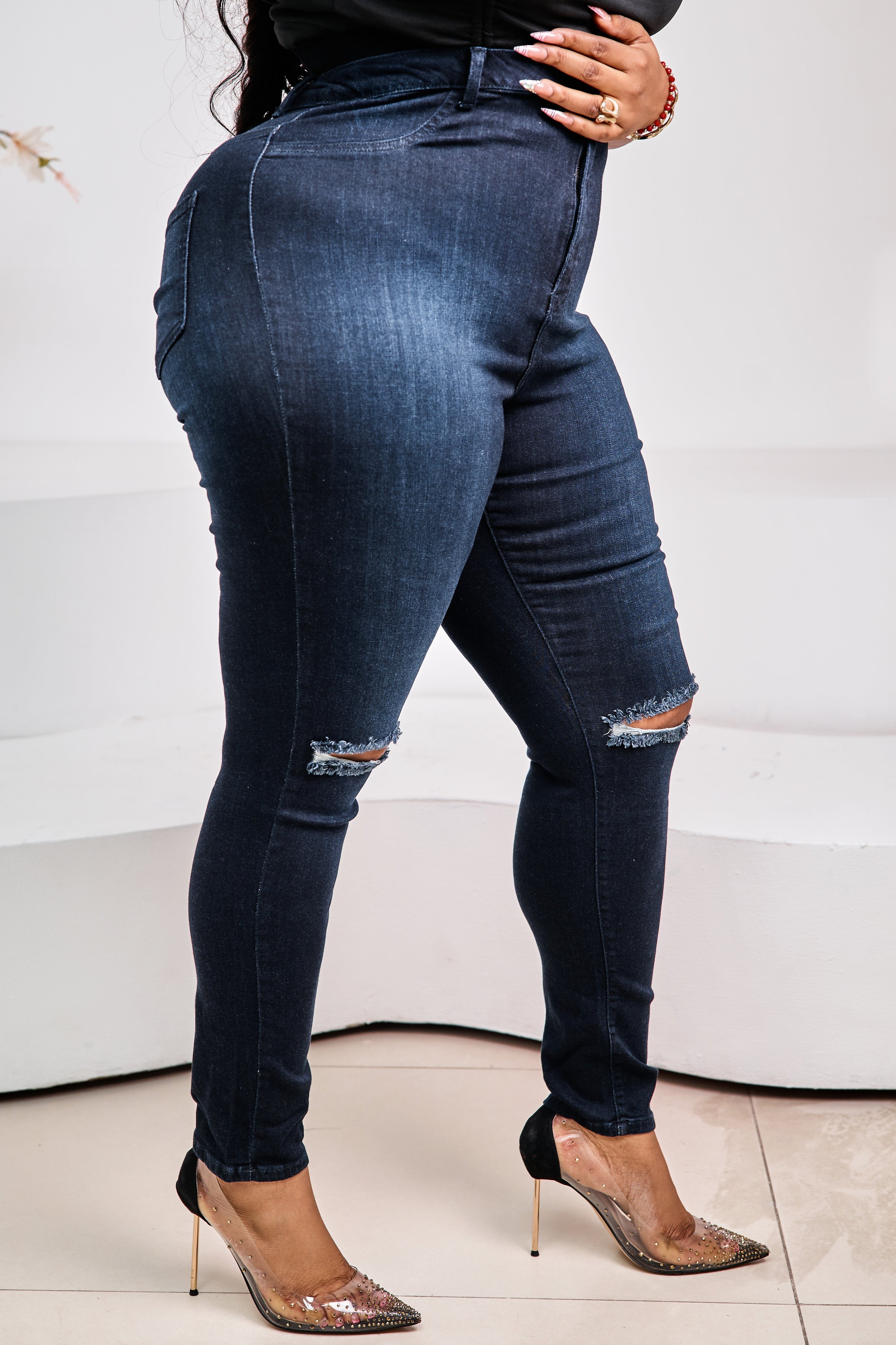 Sterra Fashion Éclipse Sculpt Denim jeans featuring a fitted design and classic blue wash, displayed on a neutral background.