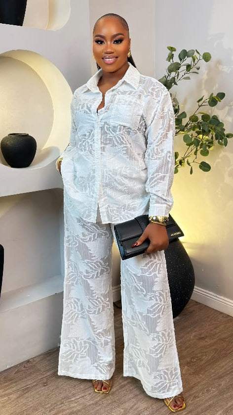 Ivory Élise set by STERA FASHION, featuring a coordinated top and bottom outfit with elegant, lightweight fabric details.