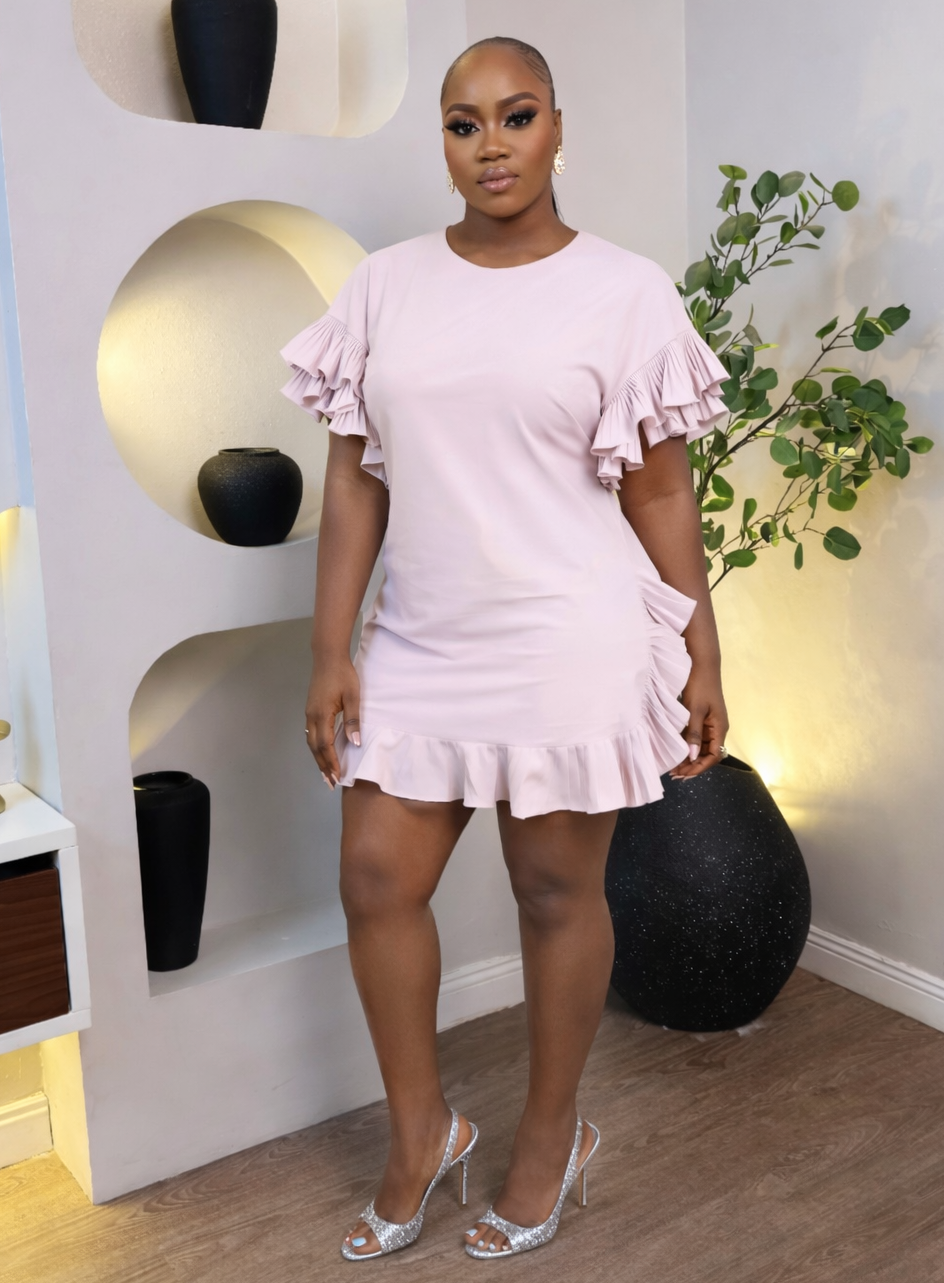 Elegant Amoure Ruffle Dress from STERA FASHION BOUTIQUE featuring delicate ruffles and a flowing silhouette, perfect for stylish occasions.