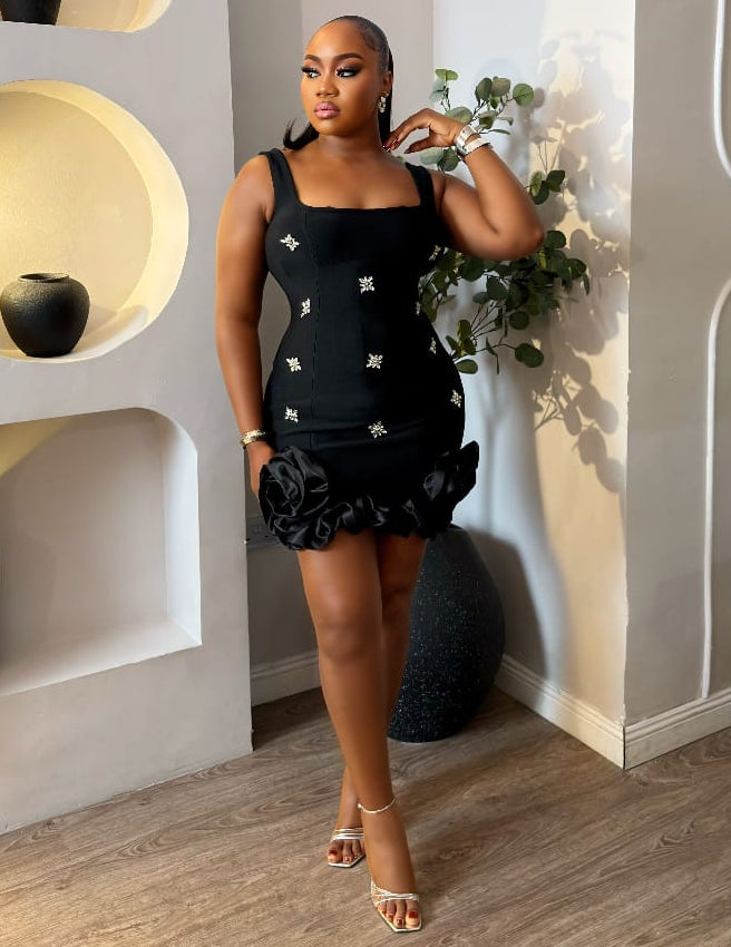 Black Noir Elowyn Dress by STERA FASHION, shown on a mannequin with elegant fit and stylish design.