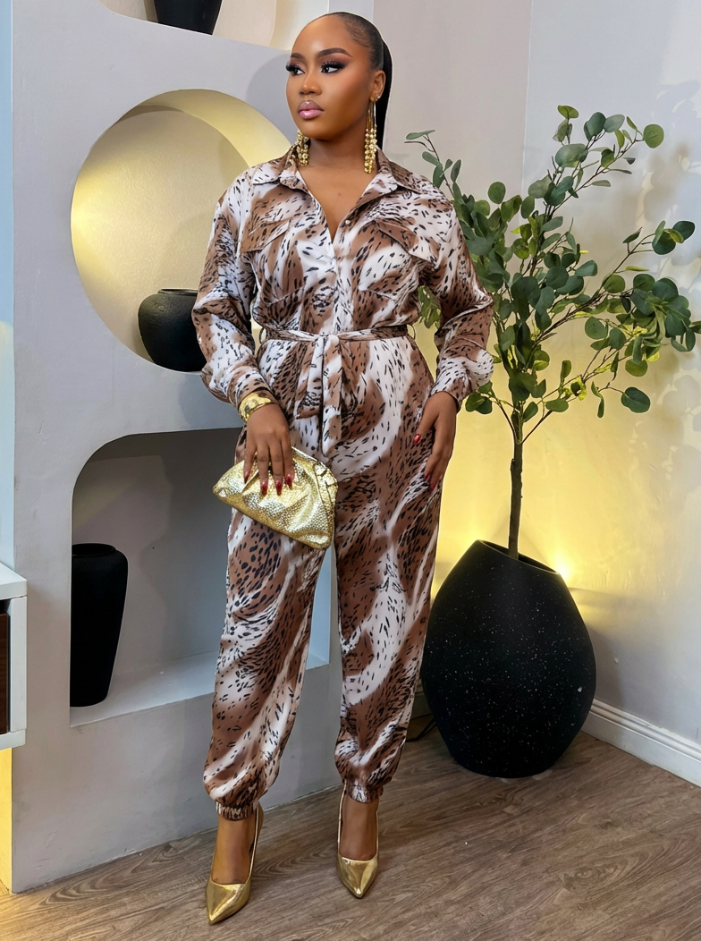 Sterra Fashion Boutique glamour Capri jumpsuit with fitted waist and wide-leg design, displayed on a mannequin.