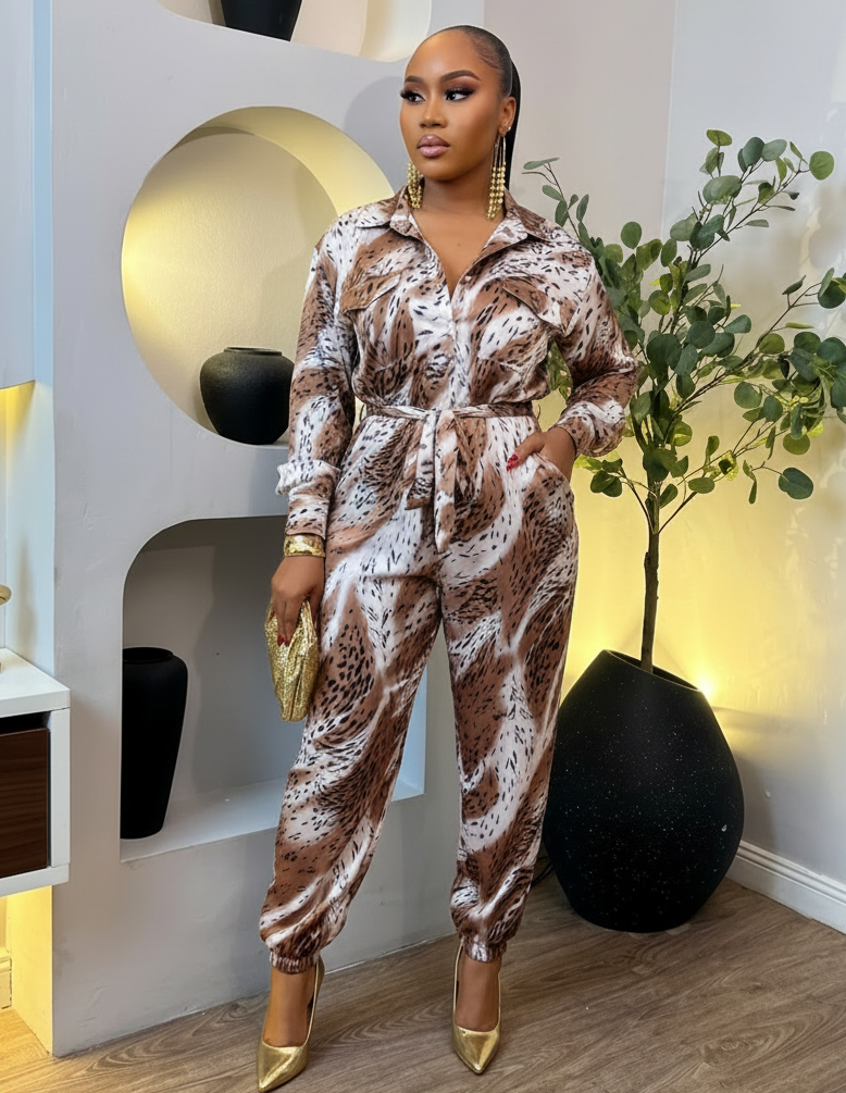 Sterra Fashion Boutique glamour Capri jumpsuit featuring a stylish fit and elegant design, showcased on a model.